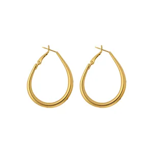 Elegantes pendientes de aro dorados cepillados con diseño de lunares negros para mujer