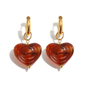 Vintage 18K gold plated stainless steel hoop earrings with amber spiral acrylic hearts
