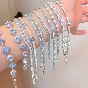 Exquisitas pulseras de circonita azul sal en varios diseños florales y geométricos para mujeres