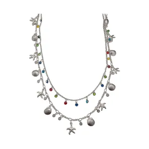 Elegante collana a doppio strato con stelle marine e conchiglie e cristalli colorati