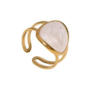 Elegant 18K gold plated stainless steel open ring with irregular white enamel stone