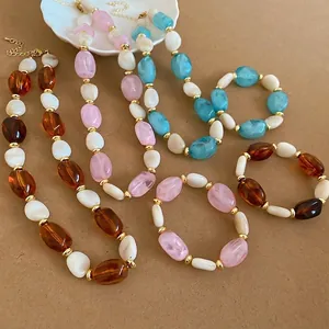 Retro-Schmuckset aus Acryl mit geometrischen ovalen Perlen, Halskette und Armband