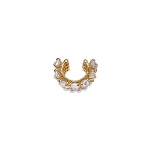 Elegant gold ear cuff with sparkling zircons and delicate pearls for non-pierced ears