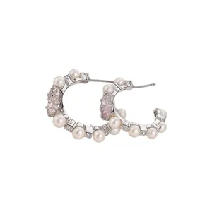 Elegant C-shaped pearl earrings with sparkling crystals for a sophisticated look