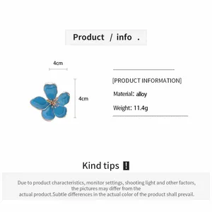 Blue enamel flower ring detail with 4cm diameter dimensions, alloy material and weight info