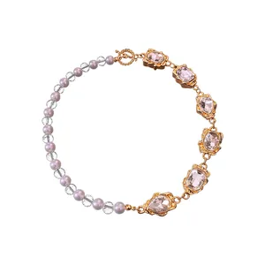Elegant French vintage palace style necklace featuring pearls and large pink faceted crystals