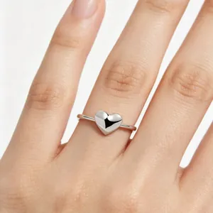 Minimalist s925 sterling silver heart ring worn on finger elegant jewelry for women