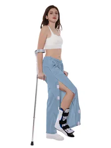 Pantalon de soins facile à porter avec boutons-pression latéraux pour rééducation