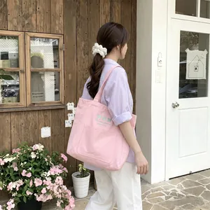 Grand sac cabas en toile rose avec broderie de nœuds pour l'été au quotidien