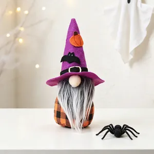 Handmade Halloween gnome doll with purple witch hat and orange checkered body table decor