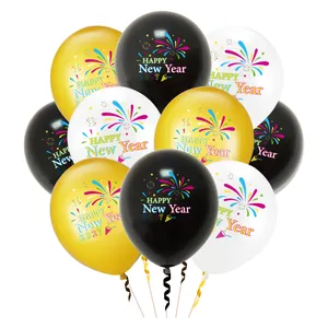 Detail view of festive gold black and white balloons with Happy New Year 2027 print