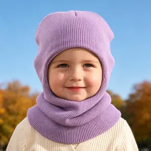 Detailed close-up view of a child wearing a purple knitted balaclava in autumn