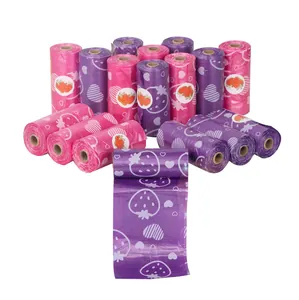 Biodegradable pet poop bags with strawberry and heart pattern in pink and purple rolls