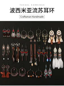 Macro view of multiple Bohemian tribal long tassel earrings in various vintage styles