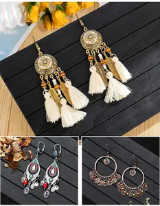 Detailed macro view showcasing various Bohemian ethnic tassel and hoop earrings styles.