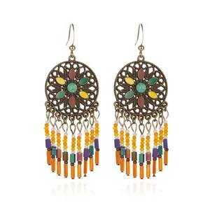 Bohemian ethnic long tassel earrings with colorful beads and filigree design