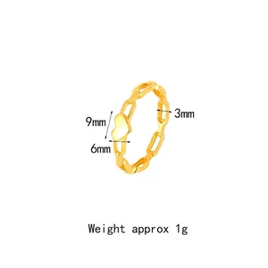 Anello in acciaio al titanio con cuori intrecciati, oro 18k - Peso circa 1g