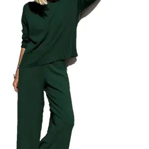 Dark green knitted two-piece set featuring a cozy pullover sweater and wide-leg pants