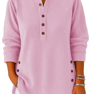 Elegant casual pink ribbed V-neck long sleeve top with decorative buttons for women