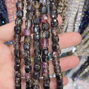 Detailed view of 8x9mm faceted cylindrical black rainbow glass crystal beads