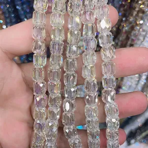 Detailed view of 8x9mm iridescent faceted cylindrical glass crystal beads for DIY jewelry