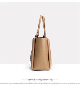 Vue de profil d'un grand sac cabas en cuir marron avec une grande capacité de stockage