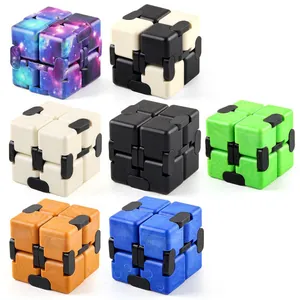 Set of seven infinite cube fidget toys in various colors for kids stress relief