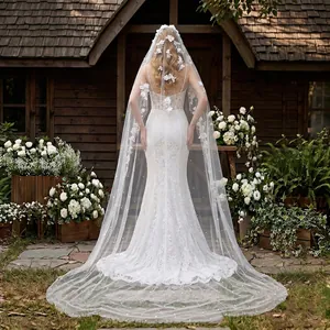 Detailed back view of a 3-meter long trailing wedding veil with exquisite floral appliques.