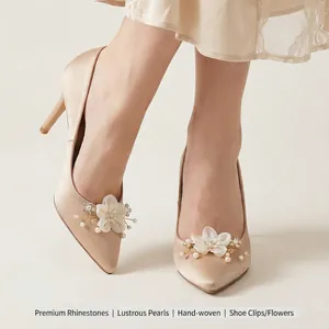 Elegant handmade flower shoe clips featuring pearls and rhinestones for bridal heels.