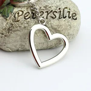 Minimalist silver hollow heart metal keychain pendant, creative gift for couples
