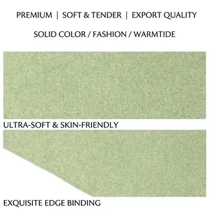Soft green wool knit triangle scarf featuring fine edge binding and premium texture