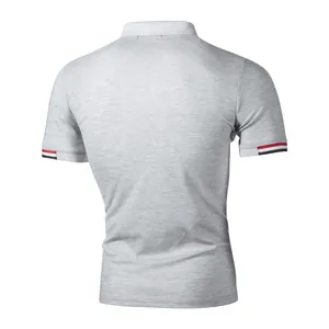 Back view detail of a classic grey short-sleeved Polo shirt with striped ribbed cuffs.