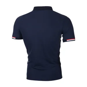 Back view of a navy blue men's slim fit short sleeve Polo shirt with striped cuffs