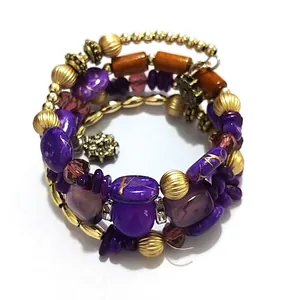 Bohemian multilayer wrap bracelet featuring purple turquoise beads and snowflake charm