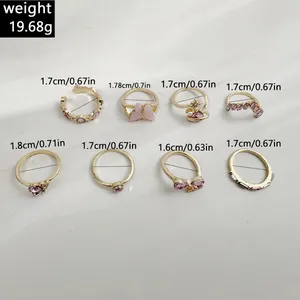 Detail view showing specific diameter measurements for the pink butterfly ring set pieces