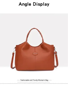Front view of vintage brown leather handbag with large capacity and shoulder strap
