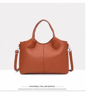 Front view of stylish brown retro faux leather handbag with adjustable shoulder straps