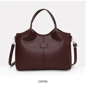 Retro dark brown leather handbag with top handles and adjustable shoulder strap