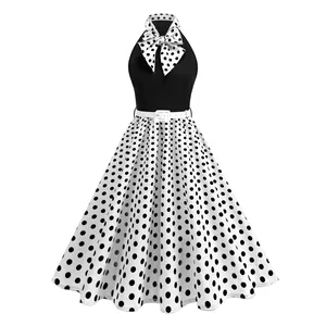 Vintage Hepburn style black and white polka dot halter dress with bow and belt