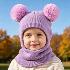 Adorably soft purple knit balaclava for kids featuring two large pink fuzzy pom-poms.