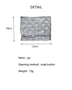 Silver quilted PU storage pouch with detailed dimensions and functional snap closure