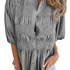 Elegant grey smocked short-sleeve button-down blouse with pleated front detail