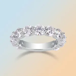 Sparkling 925 sterling silver eternity ring featuring round-cut moissanite stones