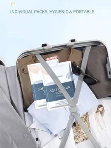 Asciugamani per il viso usa e getta confezionati singolarmente in una valigia da viaggio