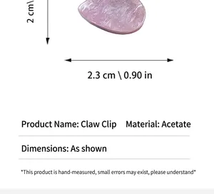 Close-up detail of small pink acetate heart hair claw clip showing size measurements