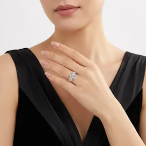 Elegant 5-carat moissanite ring in 925 silver worn by a model in black attire.