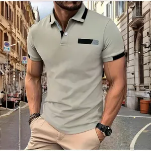 Stylish slim fit men's beige polo shirt with black contrast collar and sleeve trim detail.