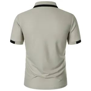 Detailed back view of a men's slim fit polo shirt in light grey with black trim accents