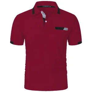 Detail view of a men's burgundy polo shirt with contrast collar and chest pocket.