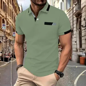 Close-up detail of a slim-fit sage green polo shirt with black trim accents